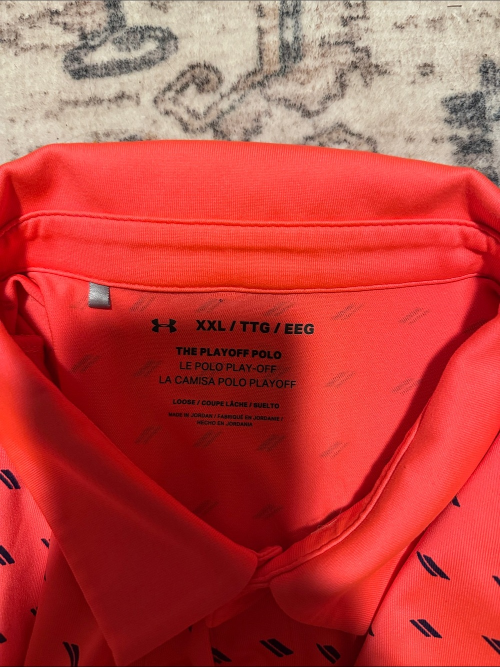 Under Armour Men’s Neon Coral Polo with Navy Accents - Picture 2 of 3